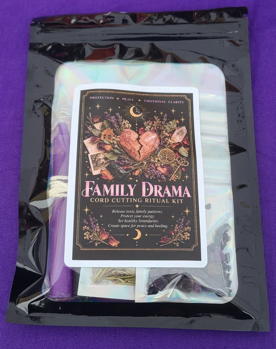 A packaged 'Family Drama' cord cutting ritual kit inside a black resealable pouch, showing a white metal tin with a dark decorative label and visible purple and white contents on a purple background.